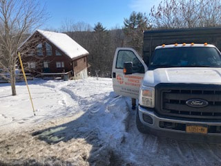 CleanBright truck arrives at water damaged home in Lake George.