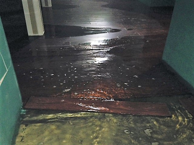 Flooded basement due to a failed sump pump