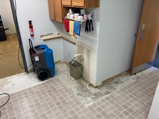 Tile floor damage from water. 